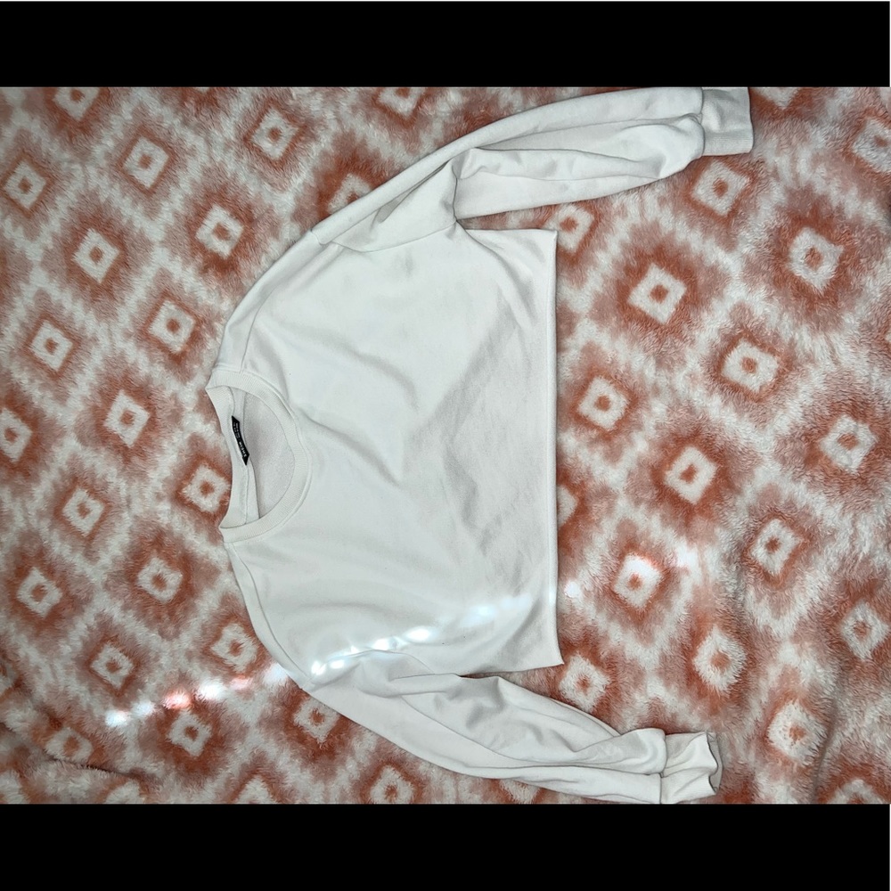 Cropped white sweatshirt.